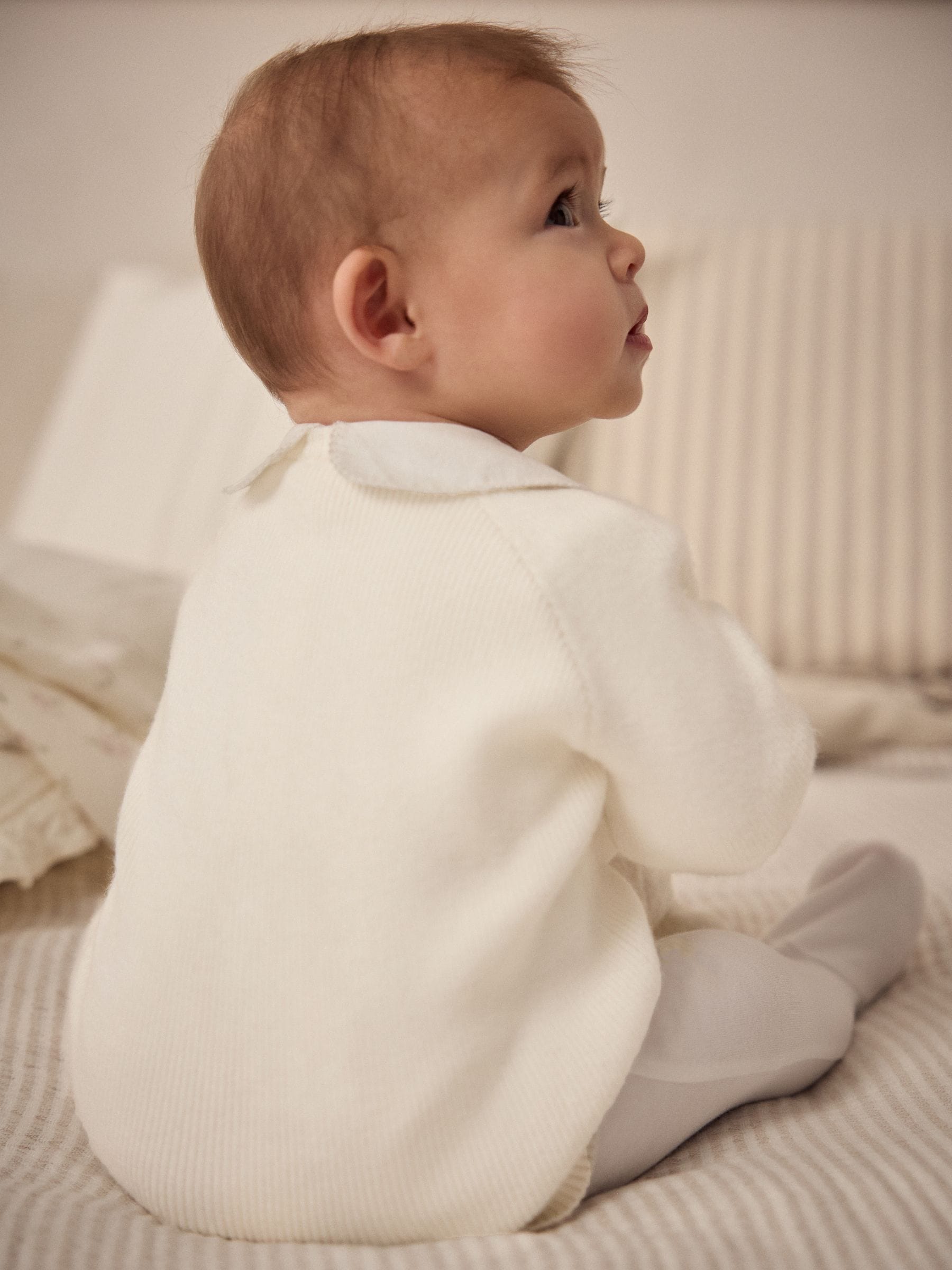 Wit gebreid - Babyvest