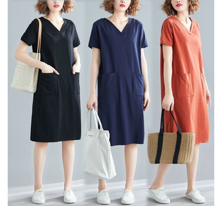 Hevnir - Midi-T-shirtjurk met korte mouwen en V-hals
