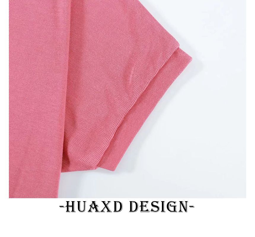 SPUCIKLEI - Tanktop met lage hals en effen kleur
