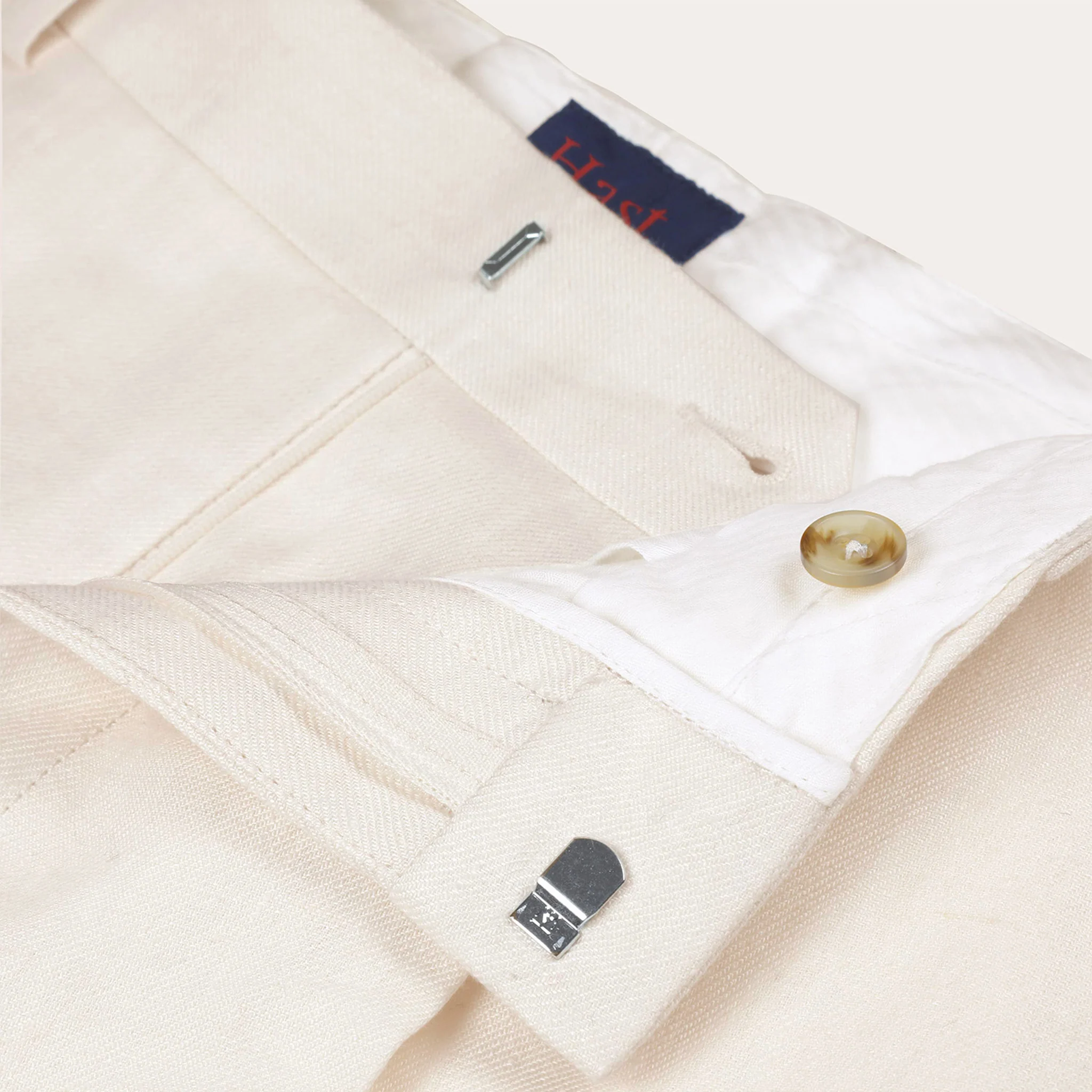 Ecru linen pleated pants