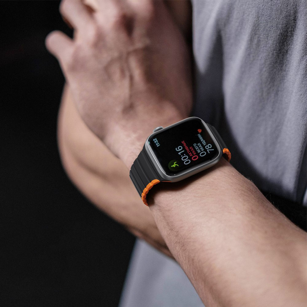 Apple Watch (42/41/40/38 mm) Silikon Armband mit Magnet-Verschluss (Gelenkumfang: 170-220mm) - Schwarz / Orange