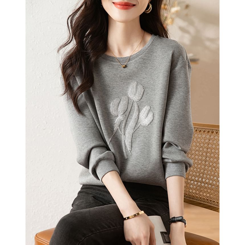Kwuartz - Sweatshirt met ronde hals en bloemenpailletten
