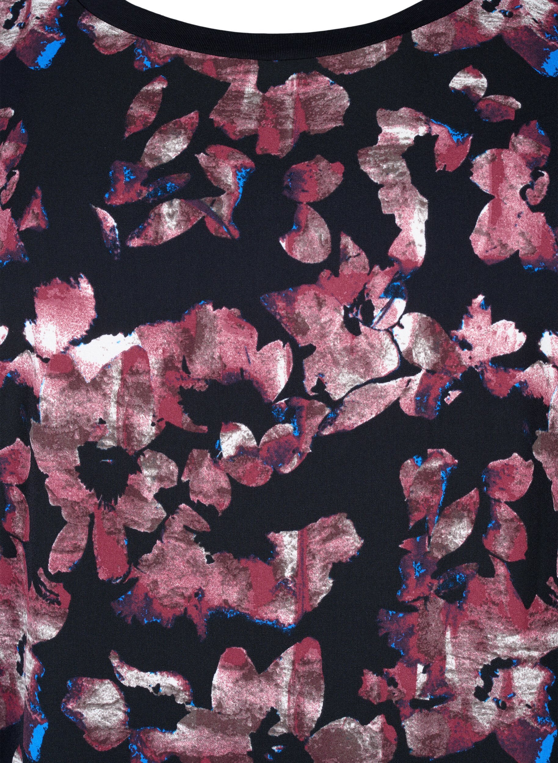 Løs t-shirt med blomsterprint