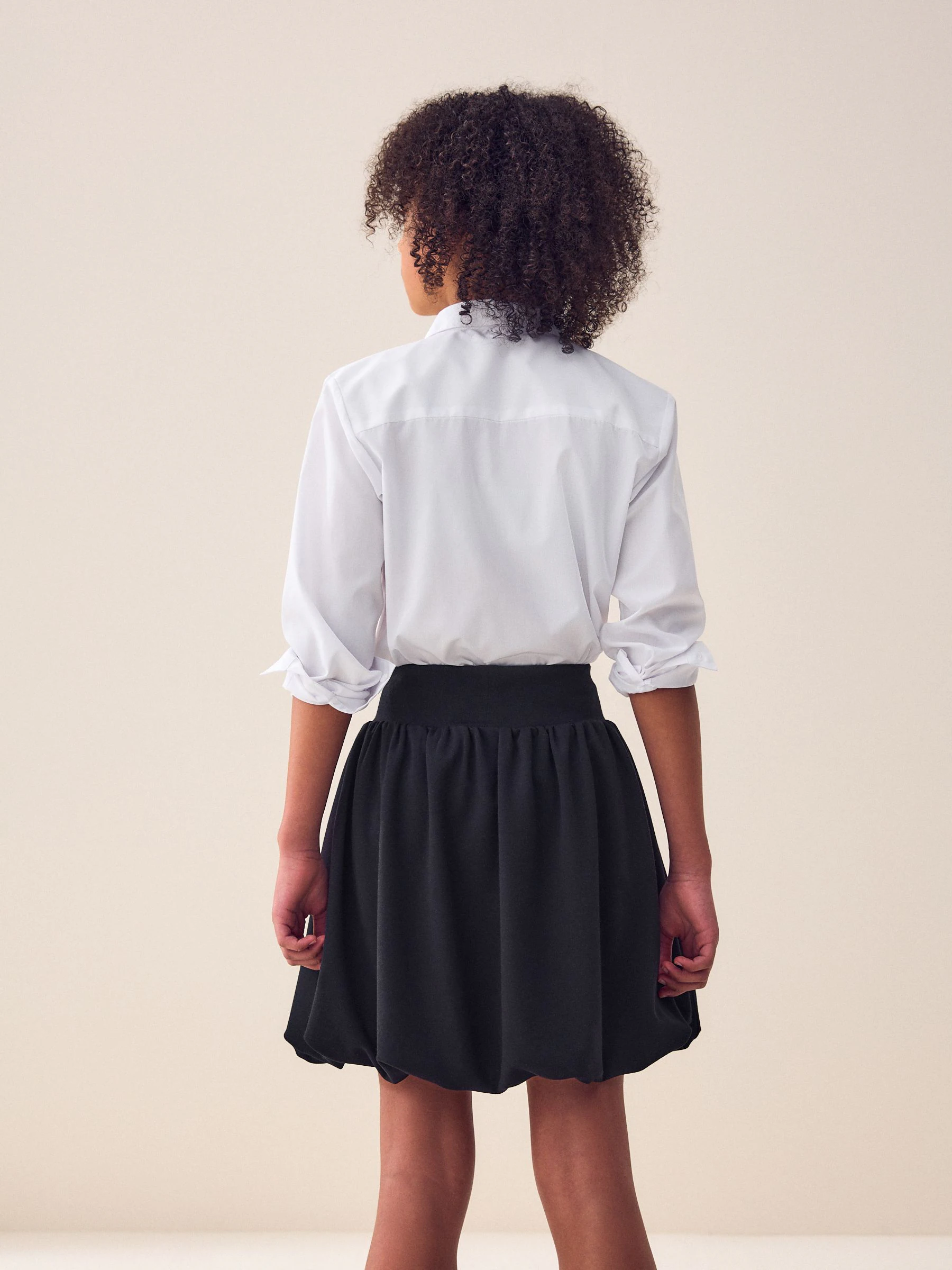 Zwart - Jersey stretch rok met ballonzoom en elastische taille (3-17jr)