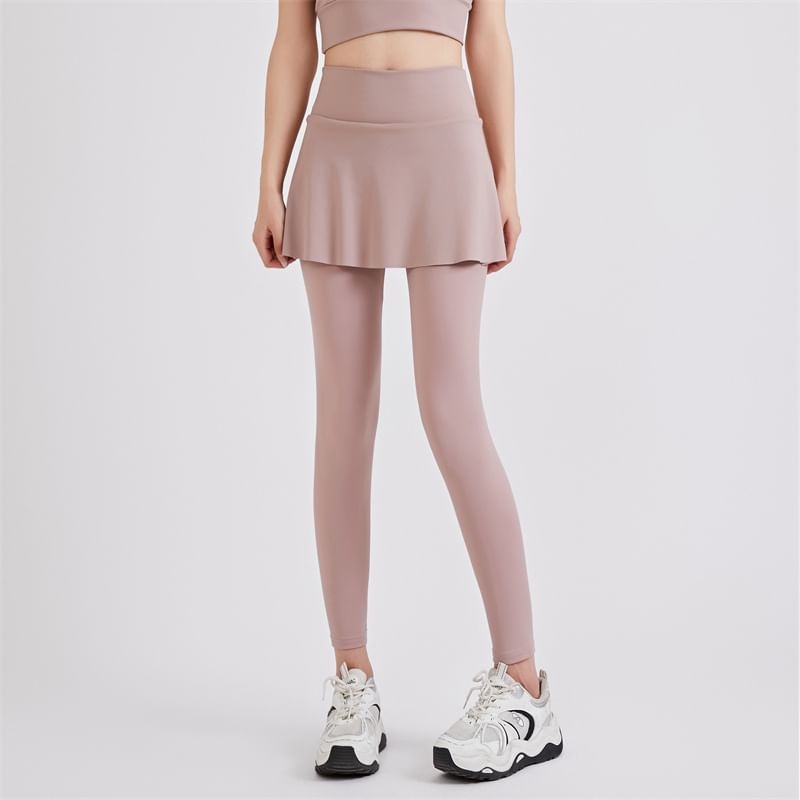 KUMI - Set: Sportieve effen bh-top + yogabroek met hoge taille en rokoverlay