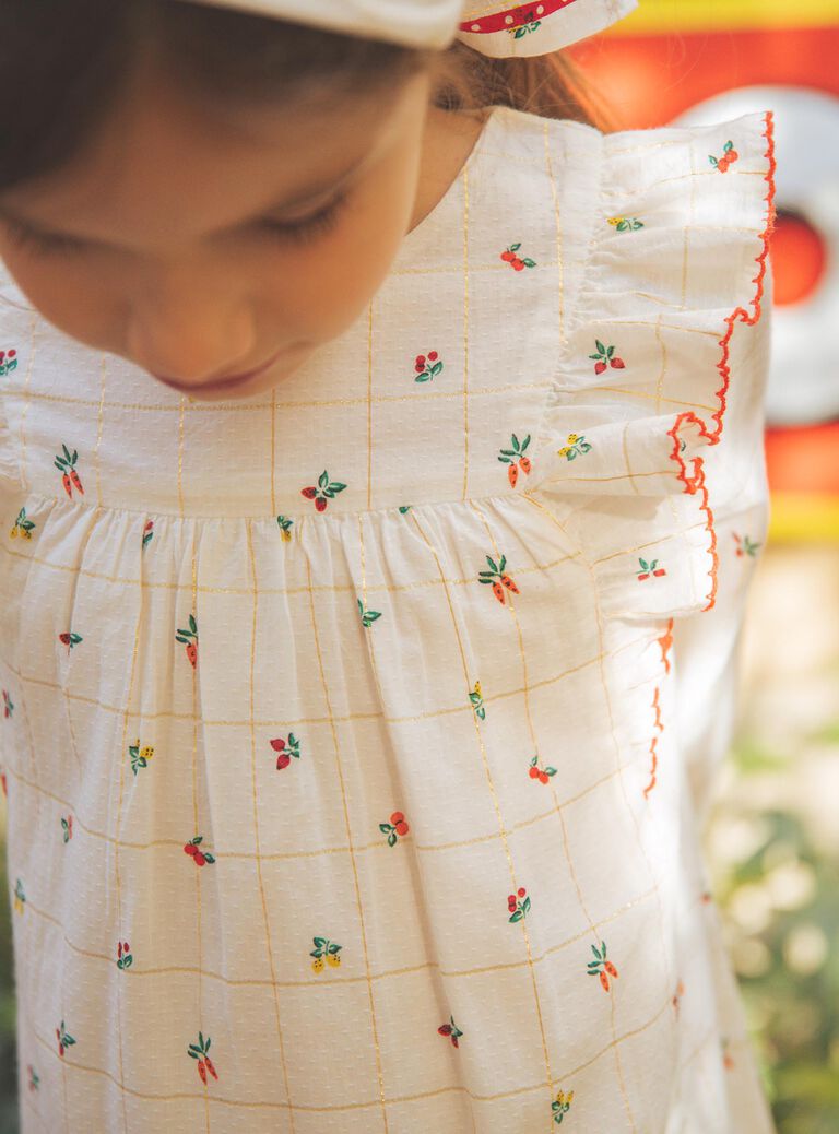 Robe écrue à volants