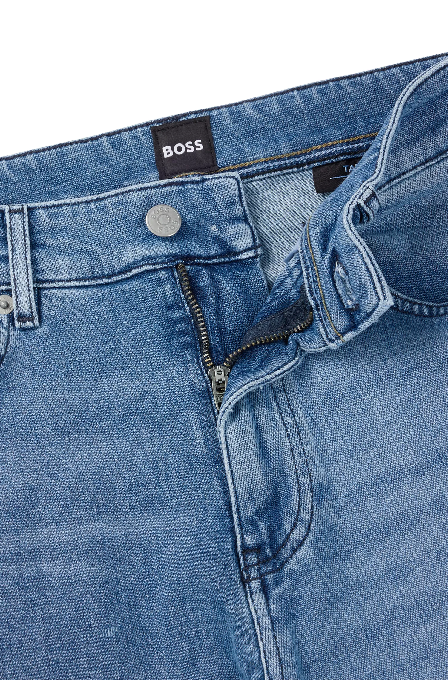 Calça jeans BOSS preta, corte afunilado, em denim azul vibrante com elasticidade confortável.