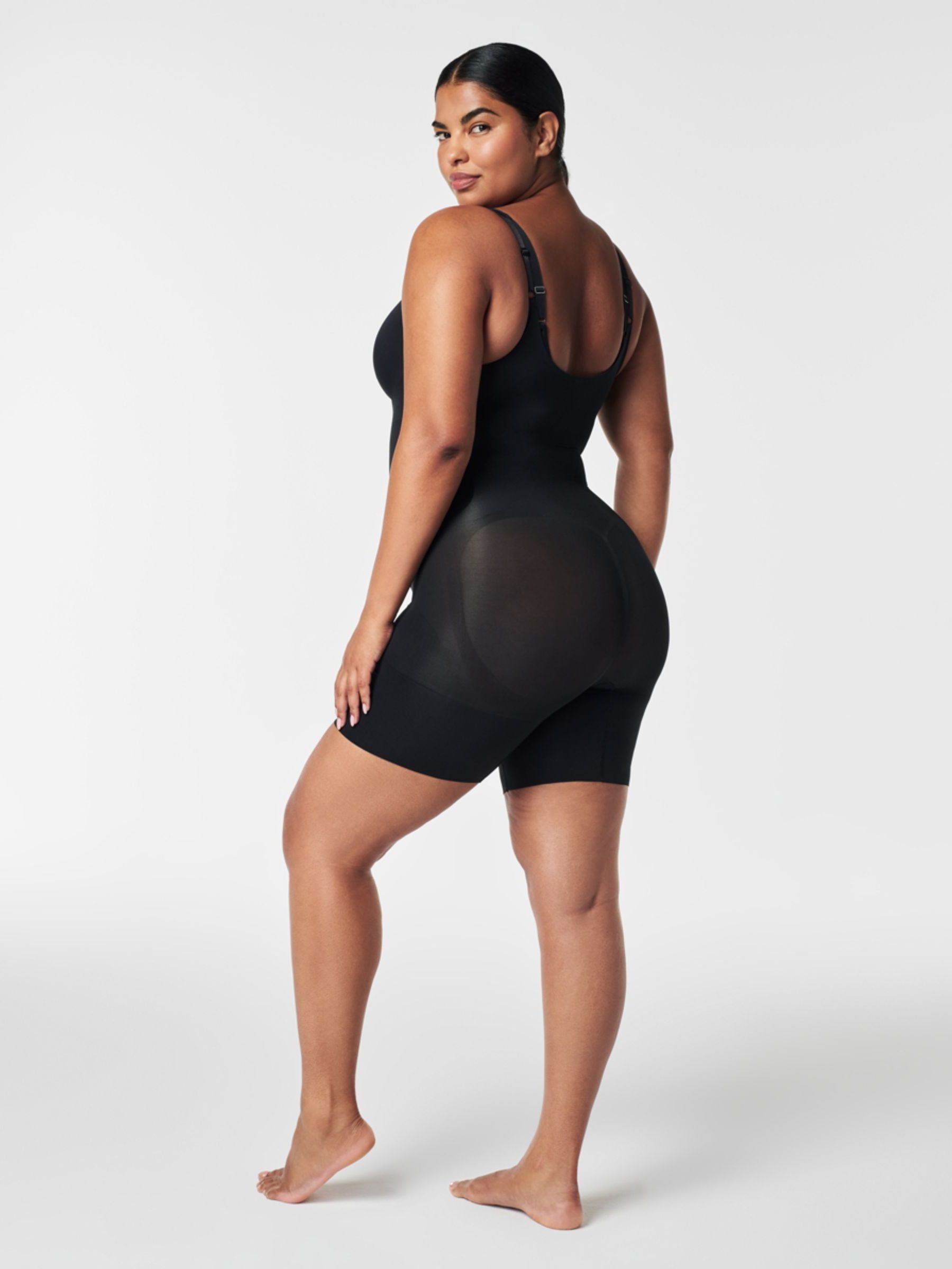 Zwart - SPANX SPANXsculpt™ OnCore-bodysuit met open buste tot halverwege het bovenbeen