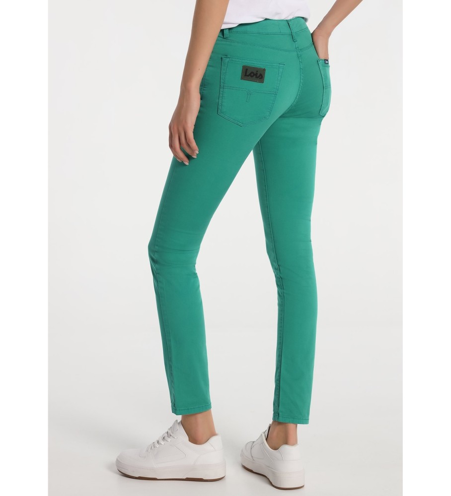 Calça Lois em sarja, cintura alta, corte skinny, verde.