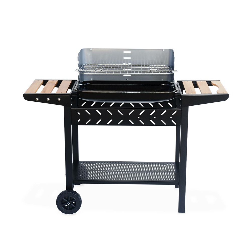 Barbecue au charbon. Noir et gris. Hauteur de grille ajustable. Cuve émaillée. Tablettes en bois + cheminée d’allumage
