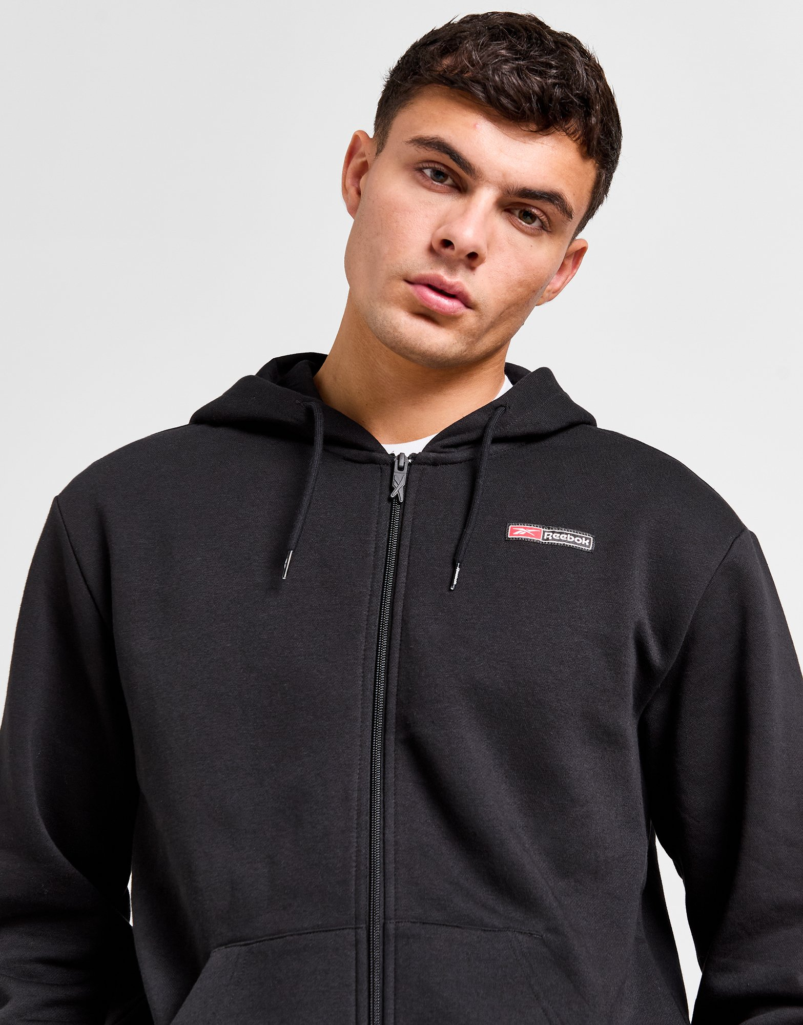 Reebok Sweat à Capuche Zippé Woven Homme