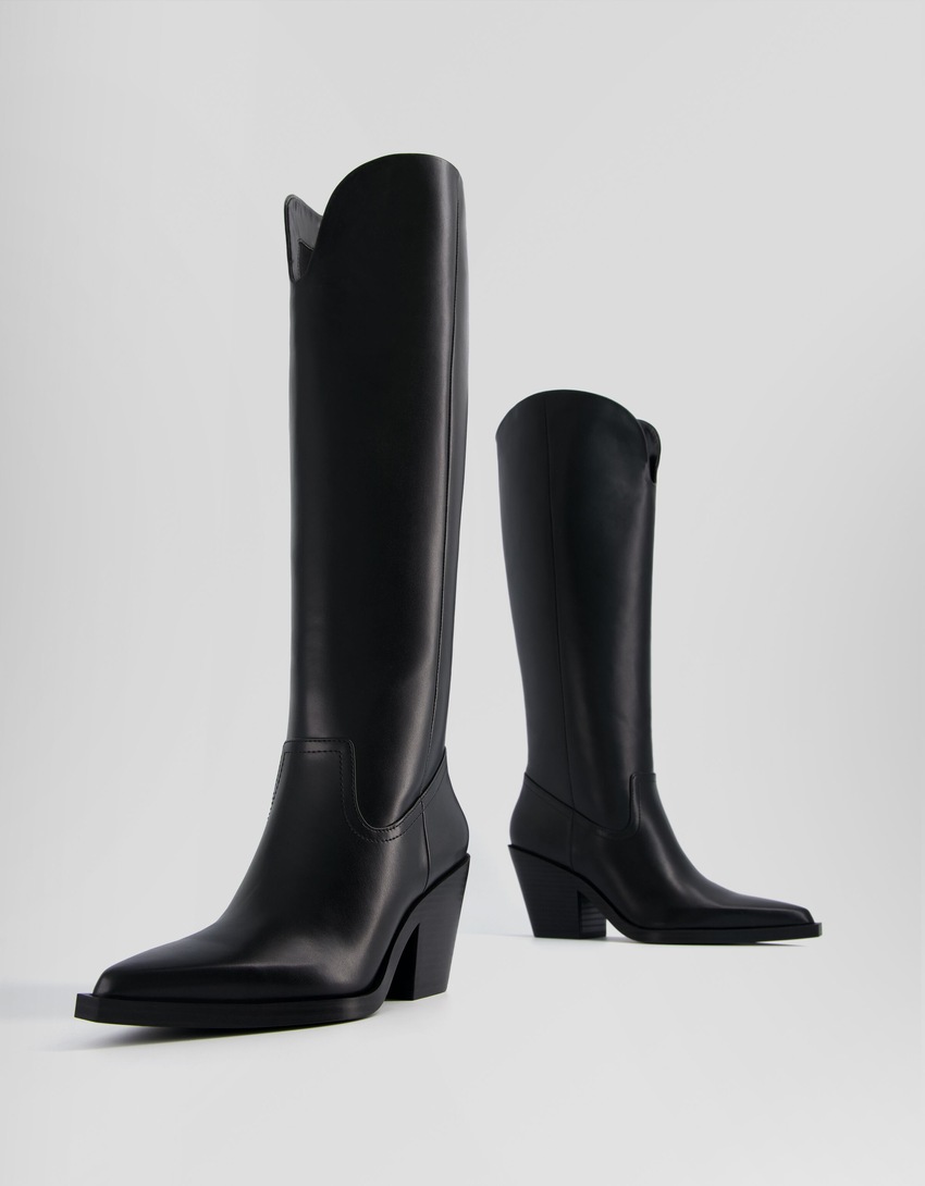 Botas de cowboy com salto alto