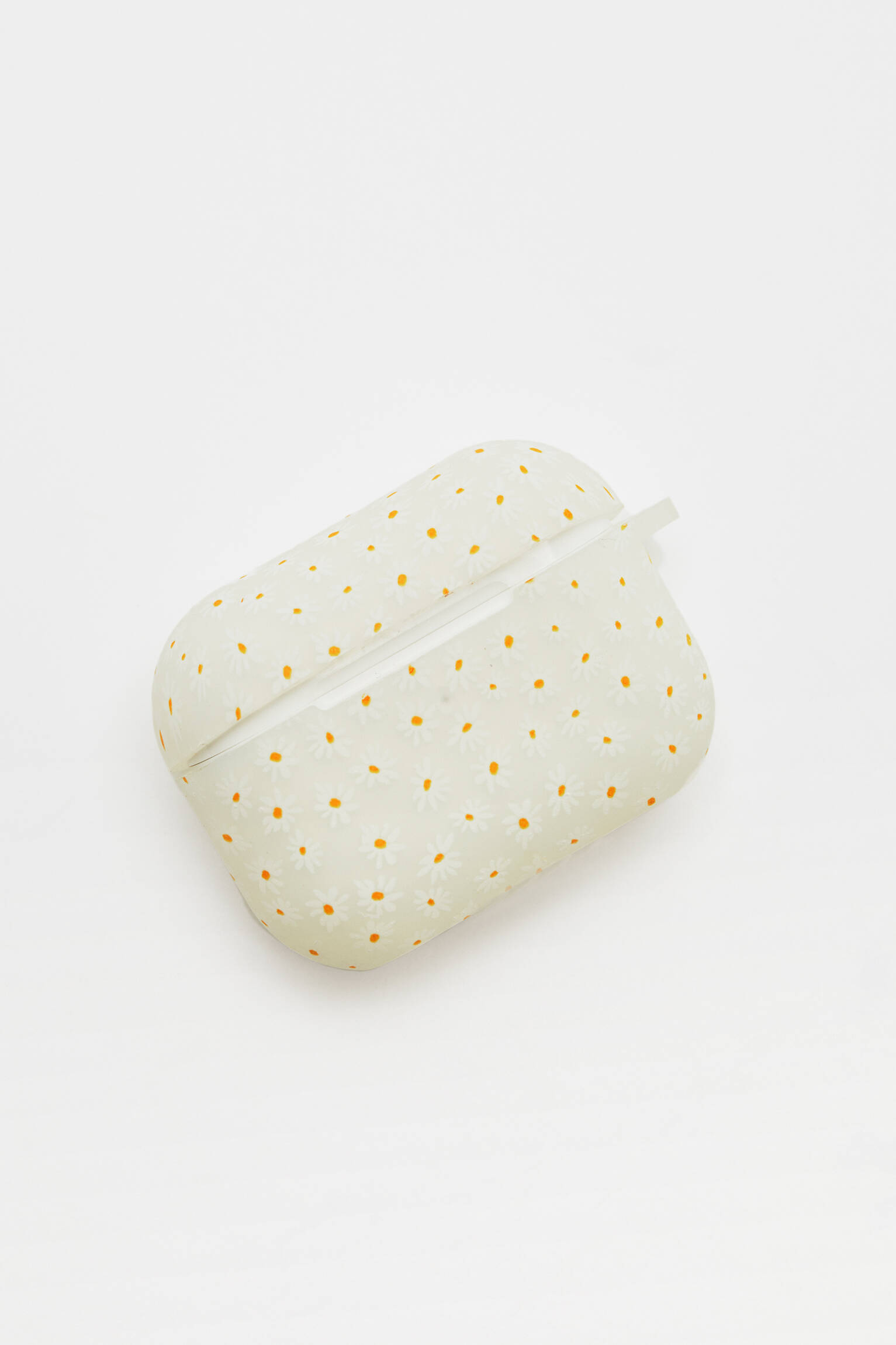 CAPA DE SILICONE PARA AIRPODS COM MARGARIDAS - BRANCA