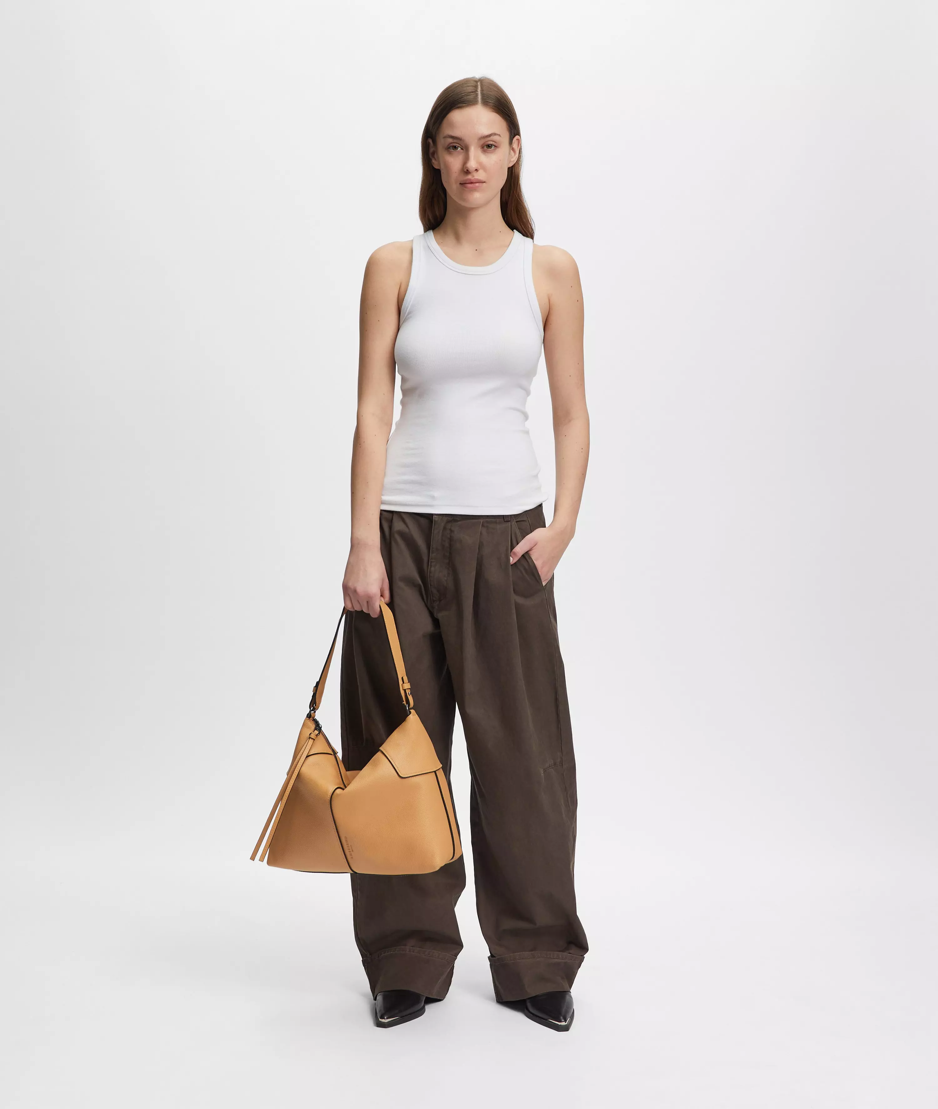 Mila Hobo M Spacious hobo bag made of cowhide leather