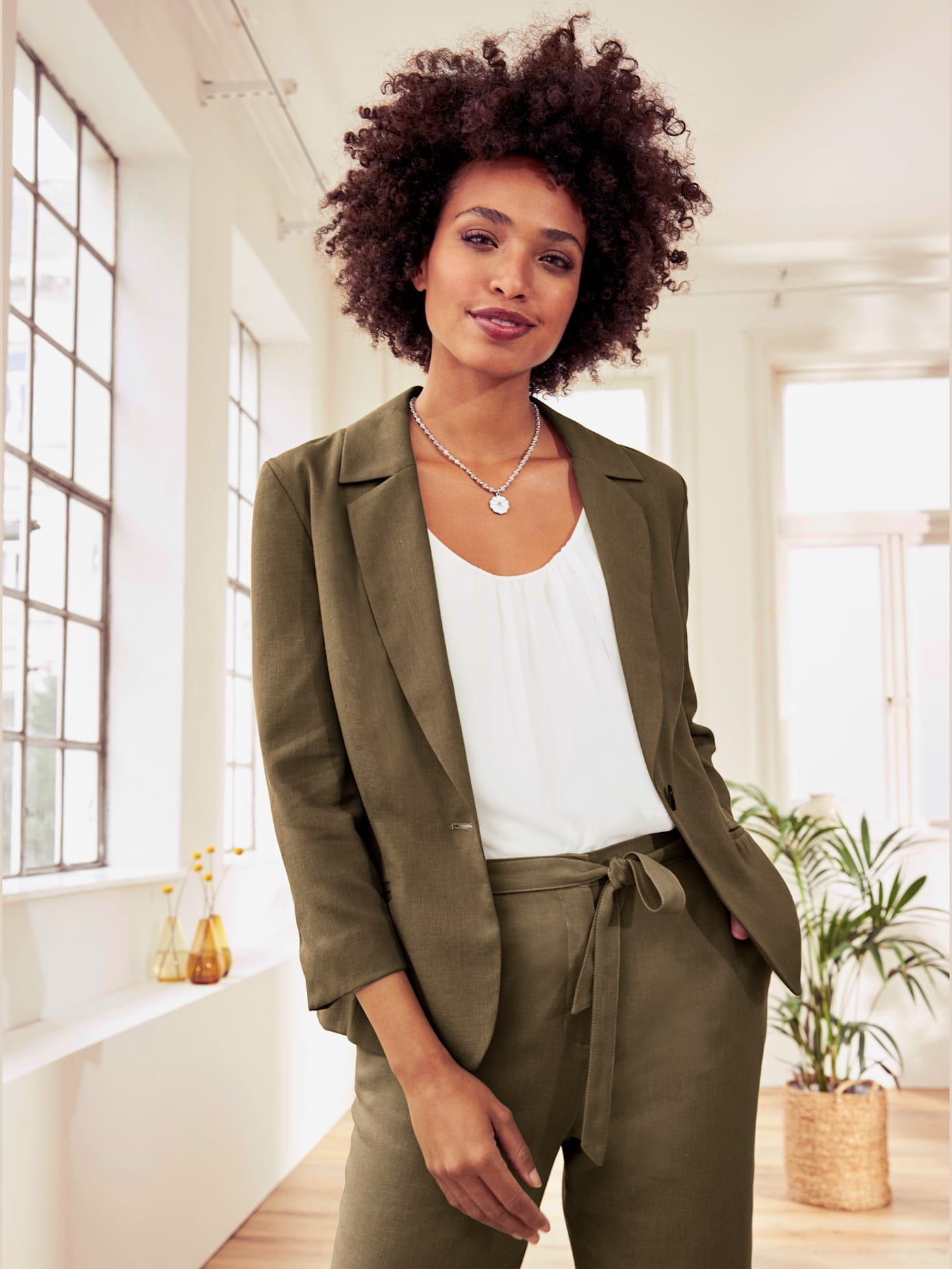 Blazer col à revers à effet affinant