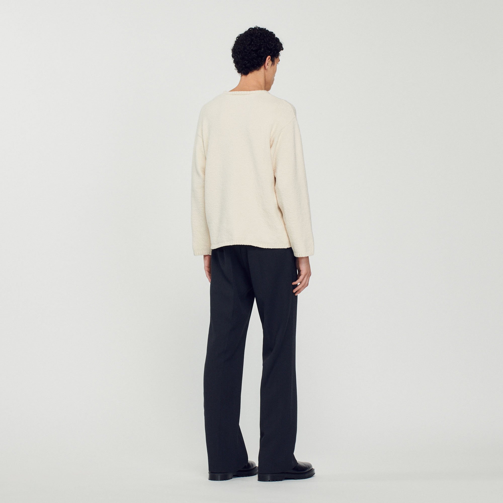 Pull en maille bouclee
