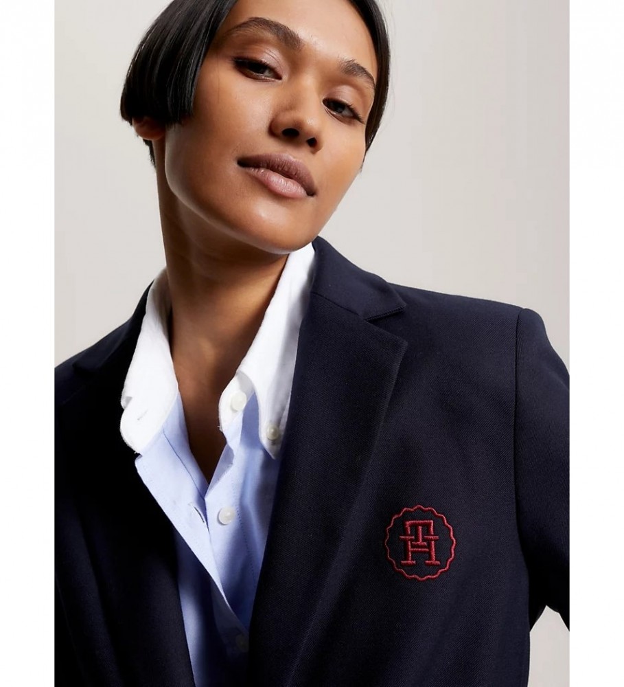 Blazer Tommy Hilfiger com monograma em estilo náutico.