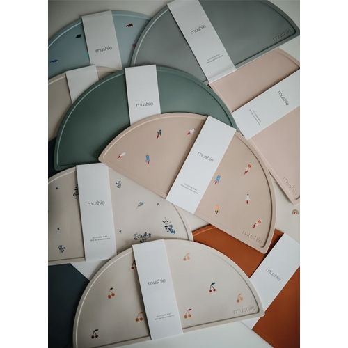 Mushie placemat rocket ship
