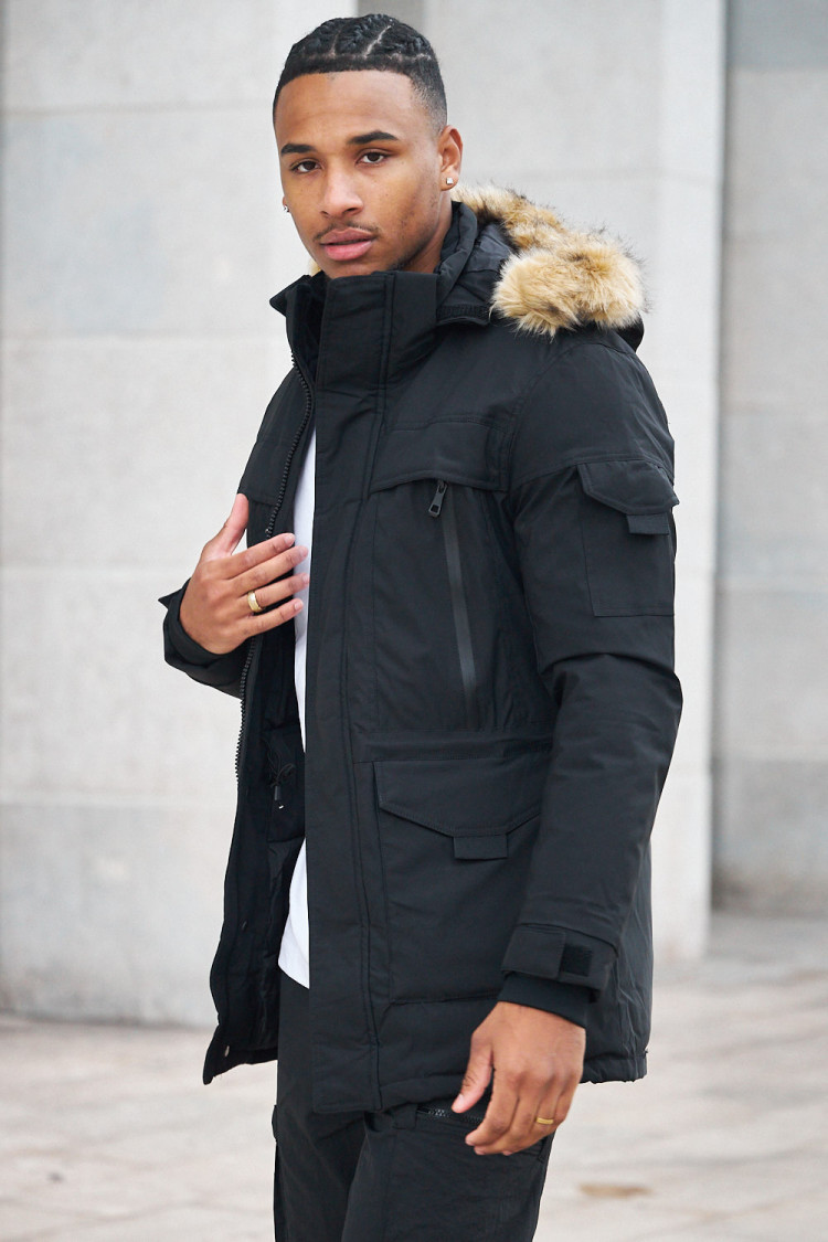 Parka bi-matière noire à capuche en fourrure