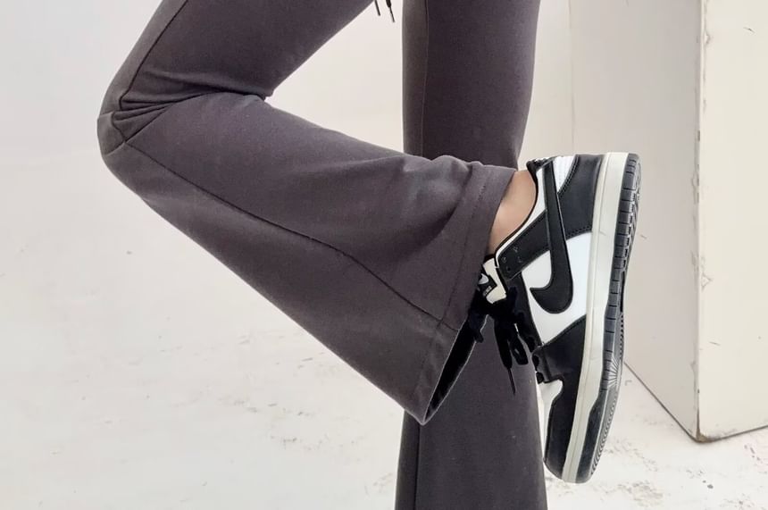 Osion - Effen wijd uitlopende joggingbroek met trekkoord in de taille