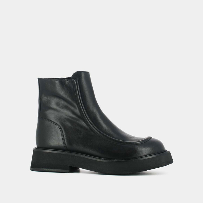 Boots à semelles plateformes et coutures apparentes  cuir noir