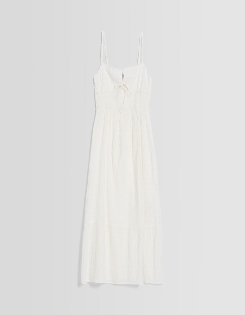 Vestido midi com alças finas, recortes e babados.