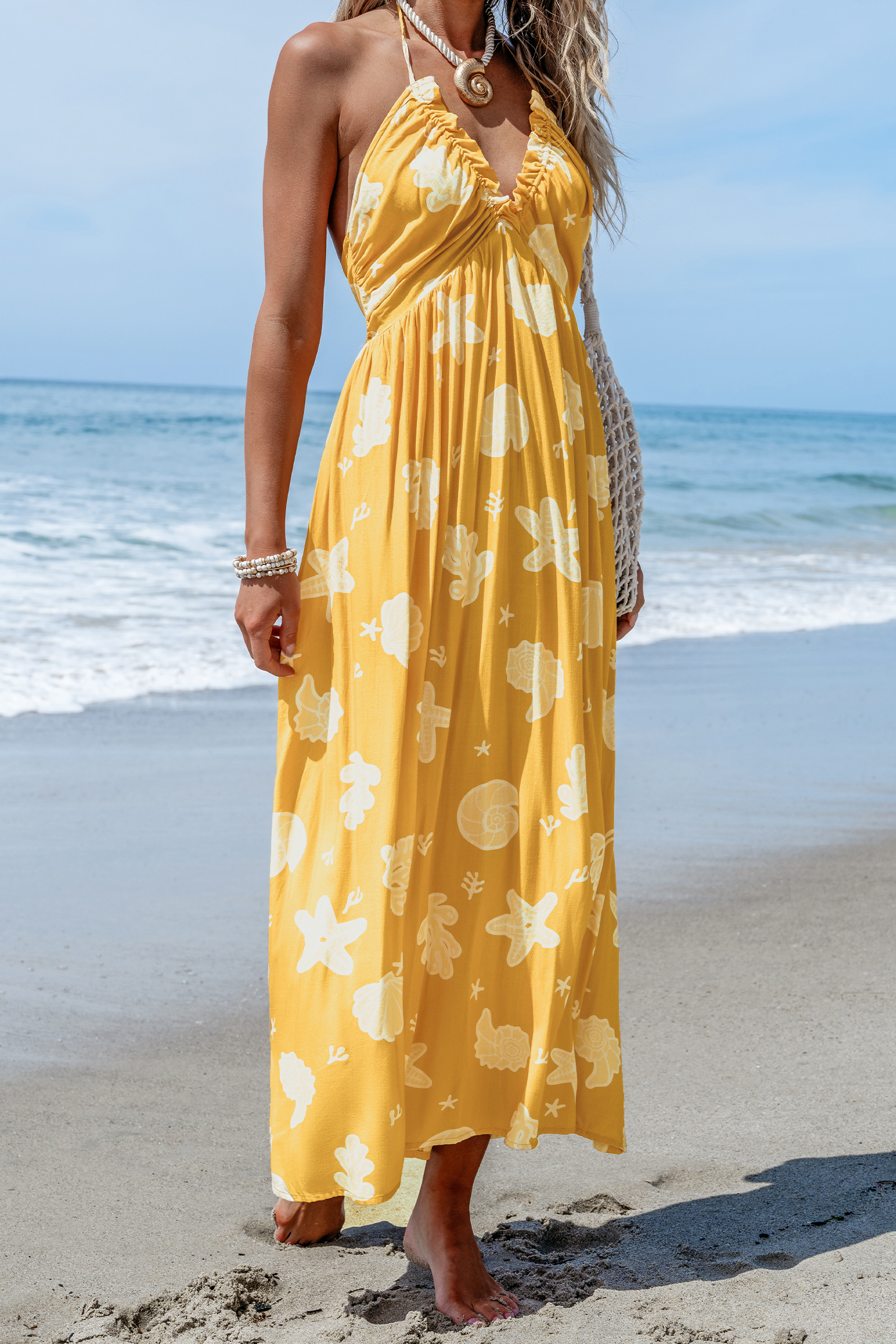 Robe maxi avec col licou plongeant à imprimé coquillages jaune