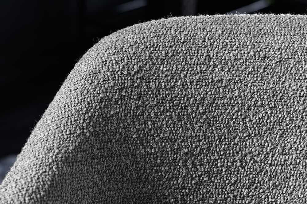 Design Stuhl VOGUE grau Bouclé schwarze Metallbeine
