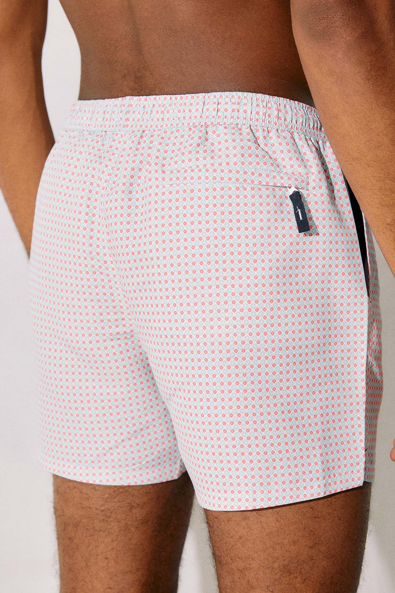 Maiô estampado com bolso pequeno com zíper - estampa laranja