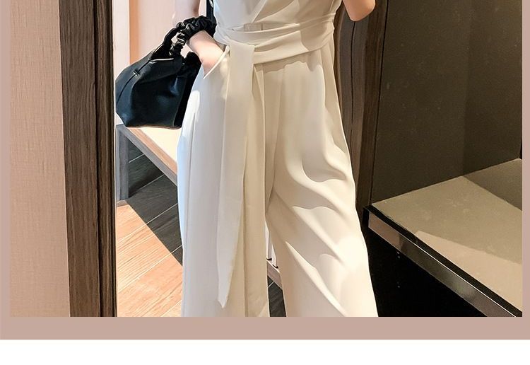 Morning Glory - Mouwloze jumpsuit met wijde pijpen