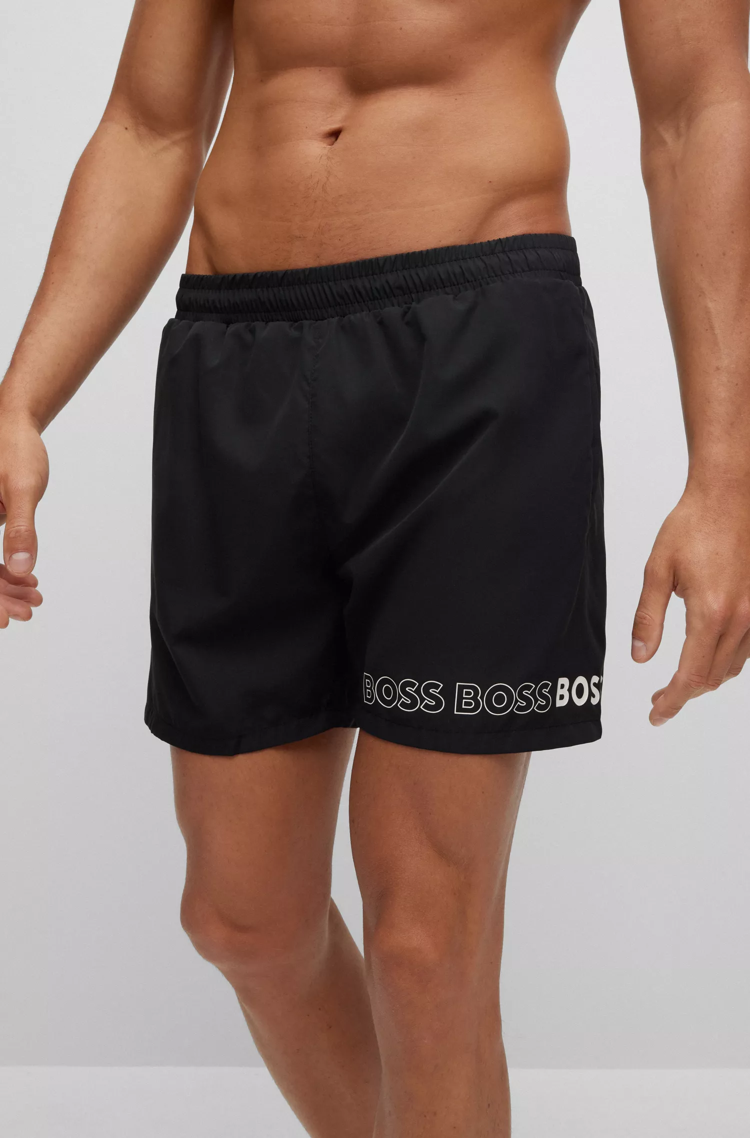 Calções de banho BOSS pretos em material reciclado com logótipos repetidos.