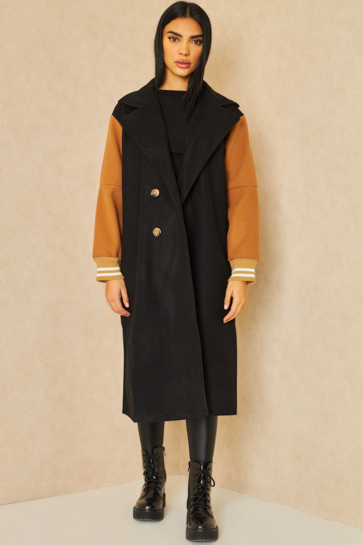 Manteau noir manches camel