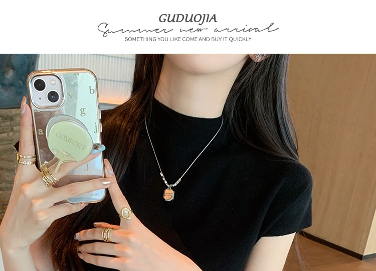 Gwendolyn - Top met capuchon en mockneck, effen gebreid