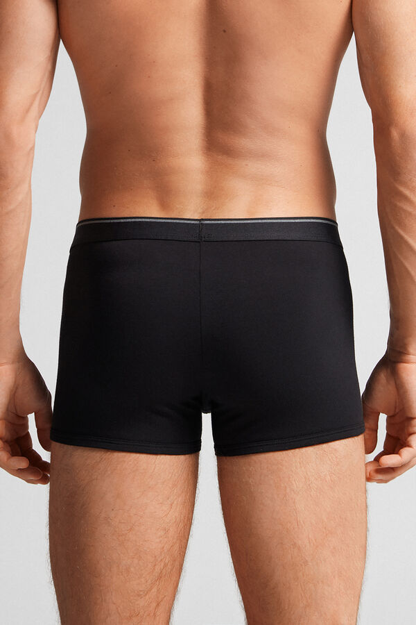 Cuecas boxer em algodão Supima® com elástico visível.