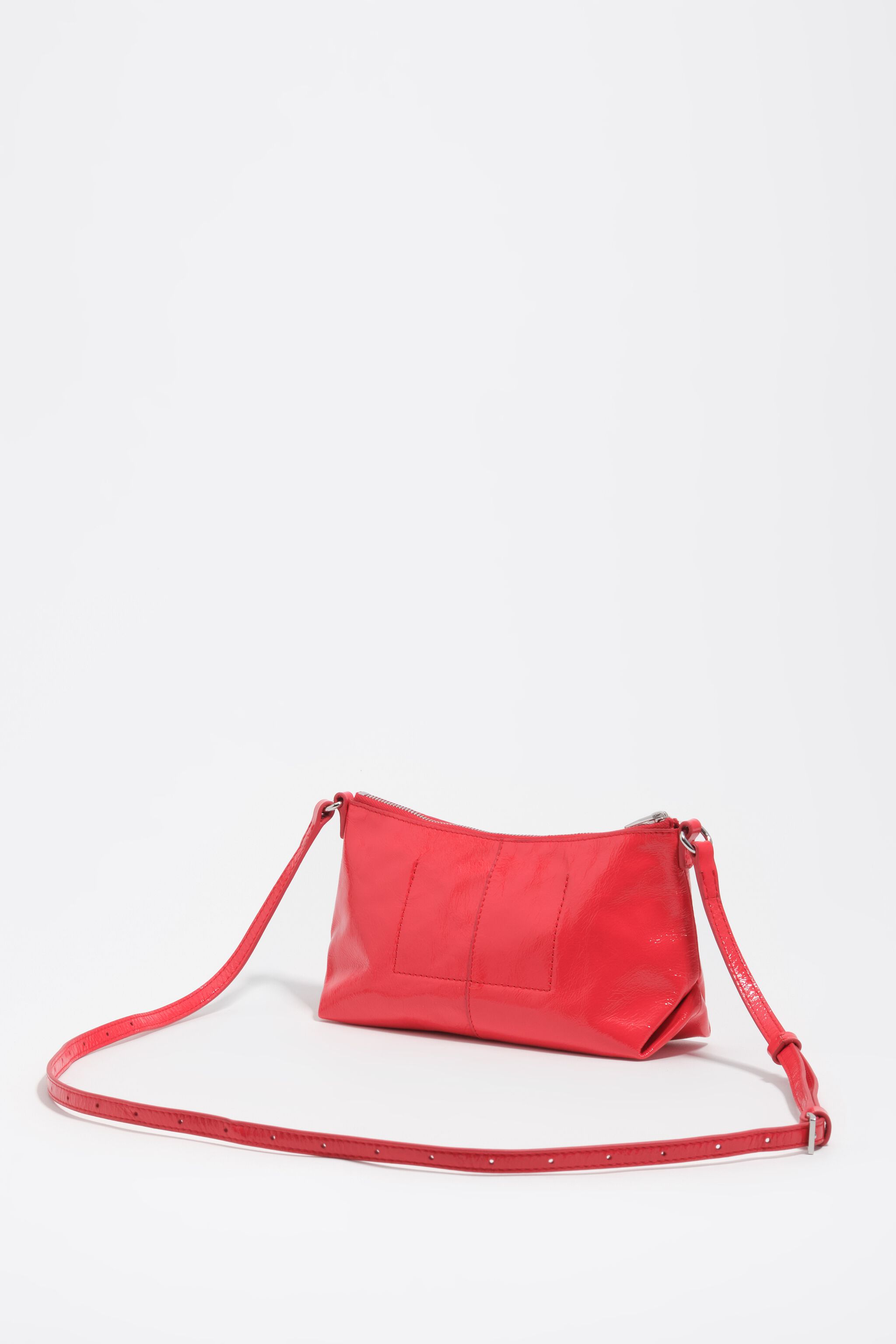 Bolsa transversal mini em couro brilhante vermelho ácido
