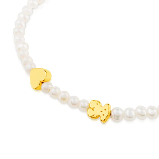 Pulseira Sweet Dolls XXS em ouro e pérolas cultivadas com motivos de urso e coração.