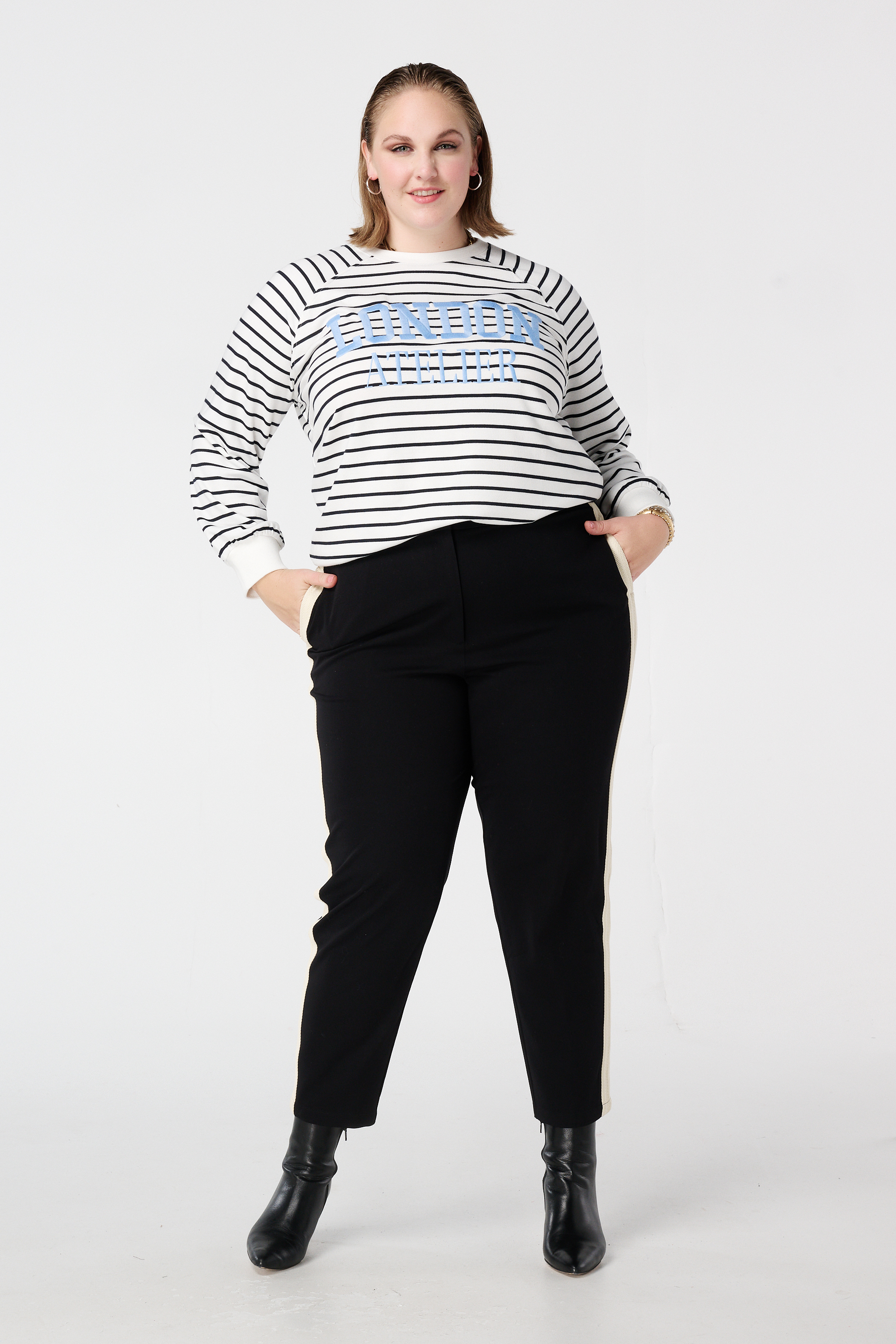 Gestreepte sweater met tekstprint Multi zwart-wit