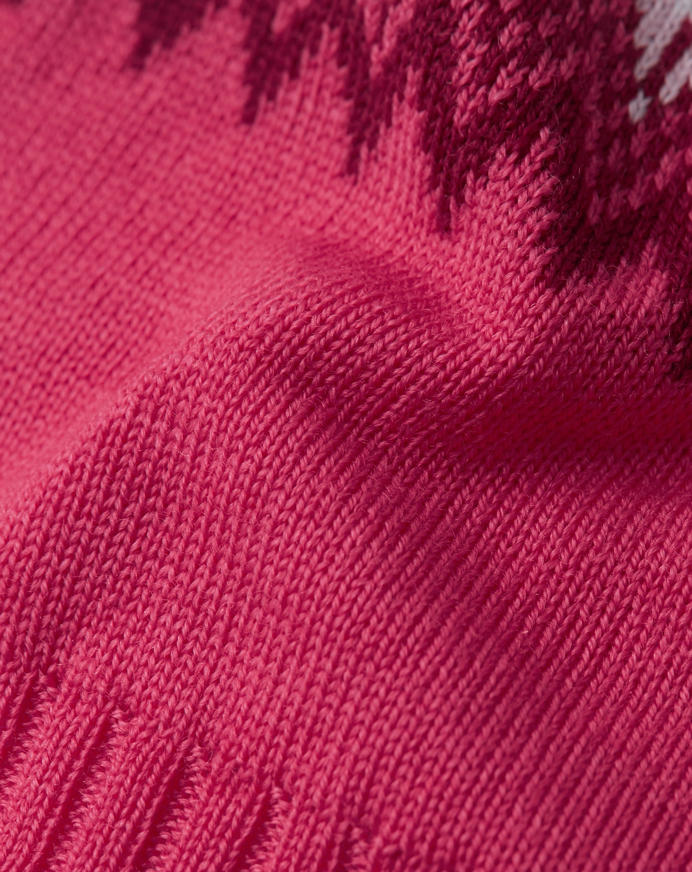 Woll-Mütze TUNTURISSA mit Bommel in azalea pink