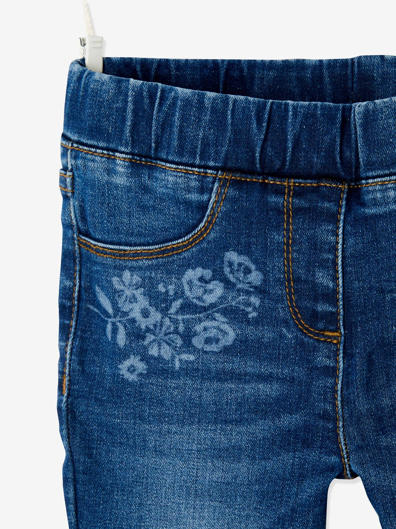 Calça legging infantil com estampa a laser, na cor azul médio lisa com detalhes.