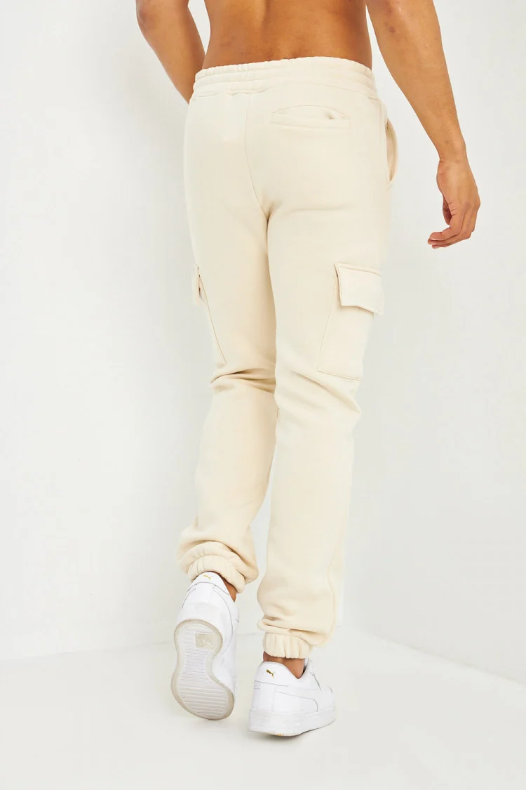 Pantalon de jogging beige clair poches cargo inscription Brentiny