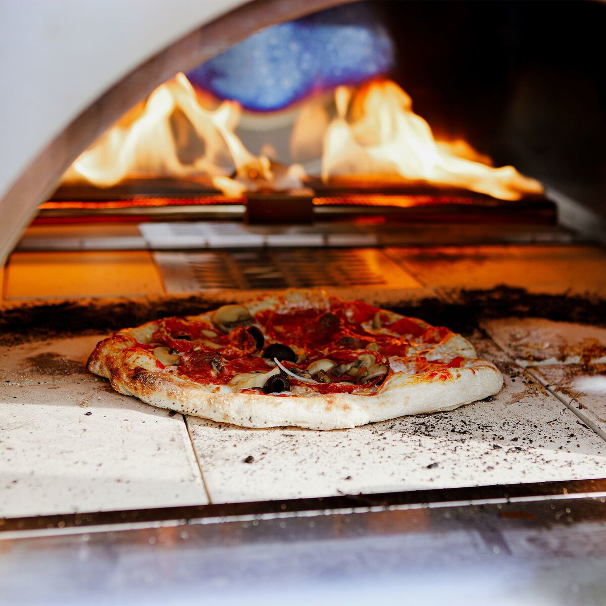 Pizzaovn på ved eller gass
