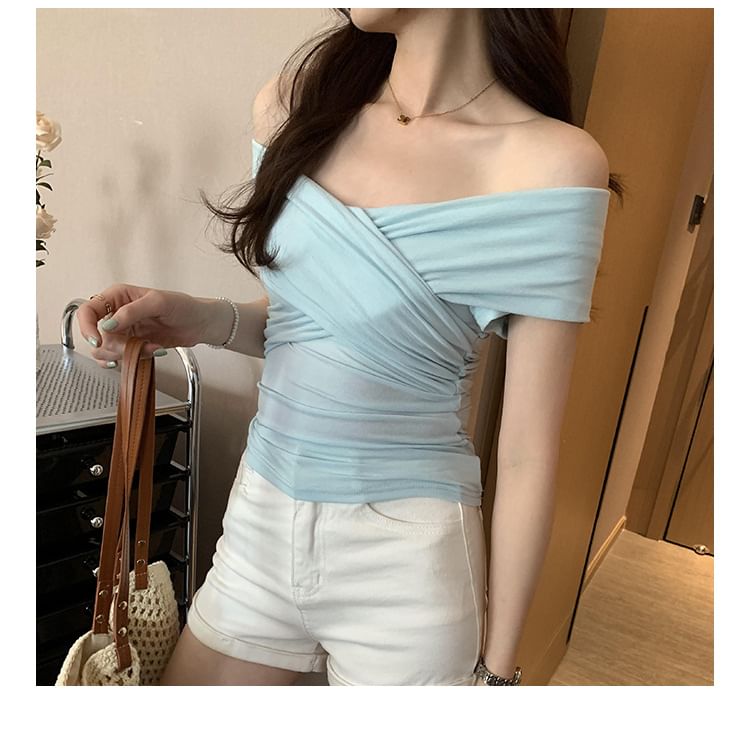 Asiris - Off-Shoulder Crop Top met korte mouwen en effen criss cross slim fit