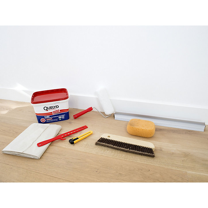 Colle pour revêtements lisses de rénovations lourds (jusqu'à 750g/m²) Quelyd pâte 1kg