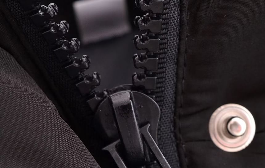 Susaine - Hooggesloten effen gewatteerd vest met rits