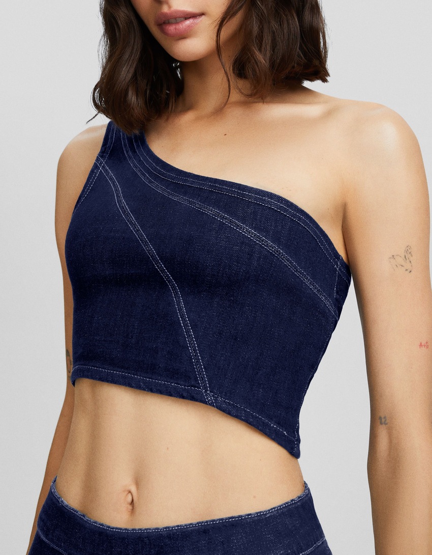Top body assimétrico em jeans