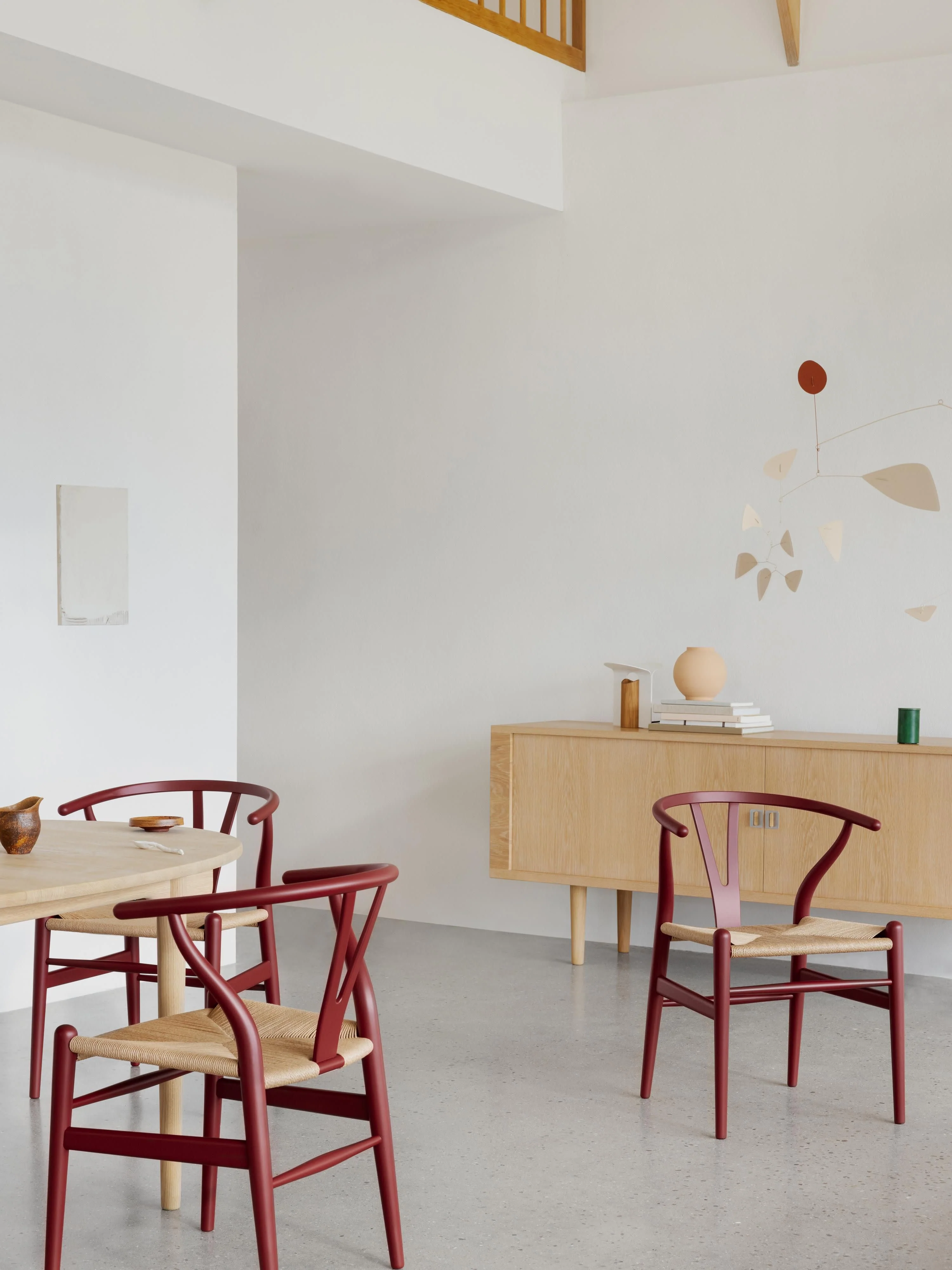 Houten stoel CH24 Wishbone Chair met handgevlochten zitvlak