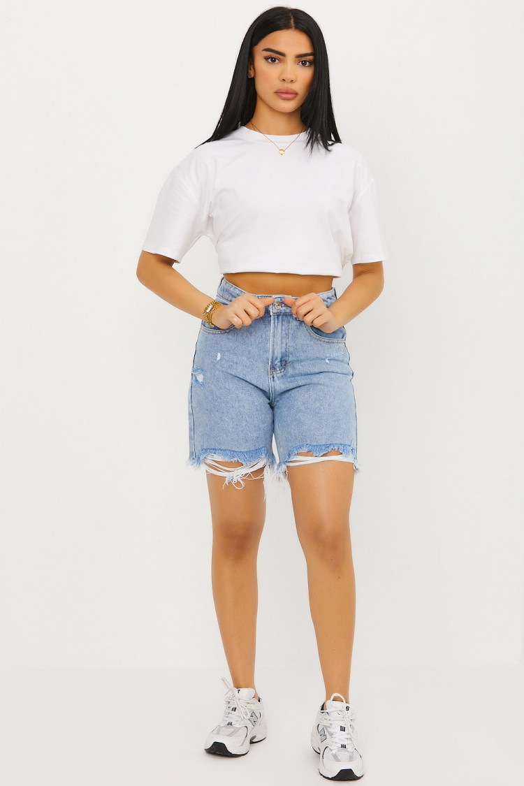 Short en jean bleu déchiré