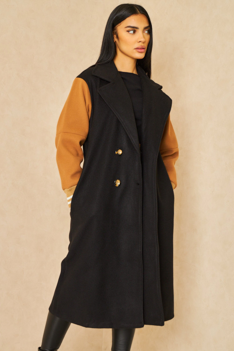 Manteau noir manches camel