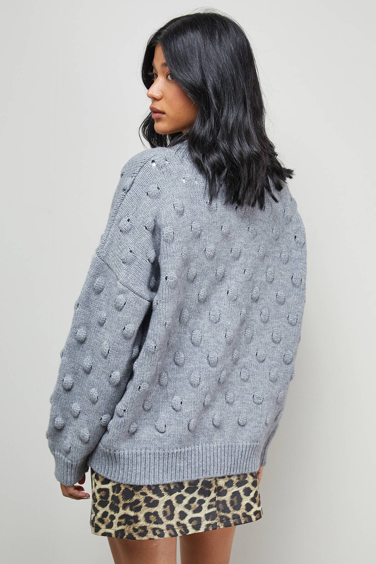Warehouse synthétiquell Col V Ample en Maille Bubble