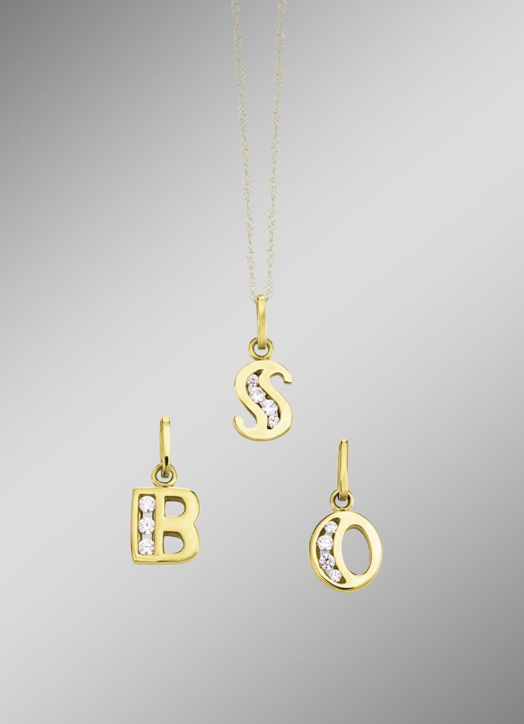 Buchstabenanhänger aus edlem Gold